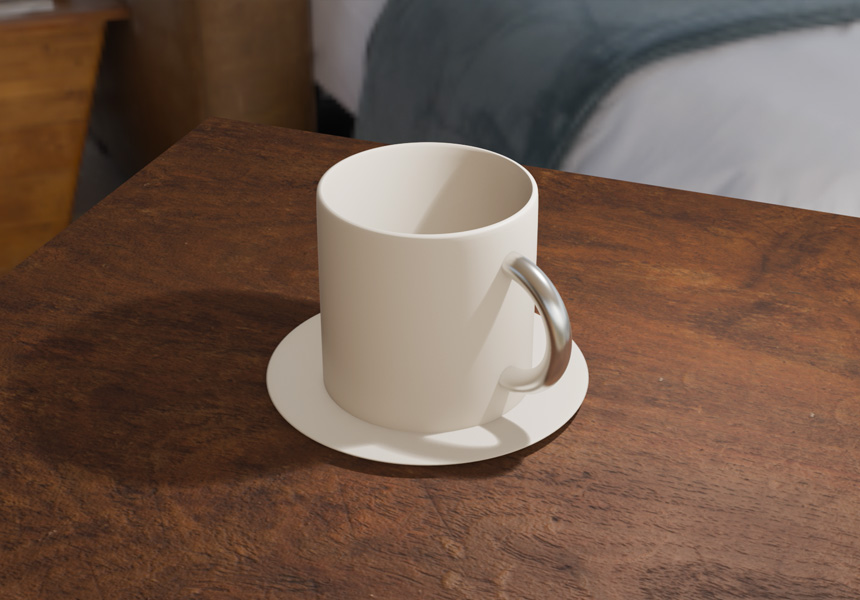 木目のテーブルの上に置かれたコーヒーカップ（記事イメージ）